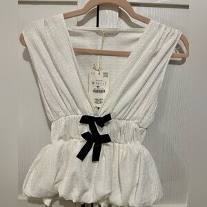 Elegant Zara White Sleeveless Top with Black Bow Accents. Size Small